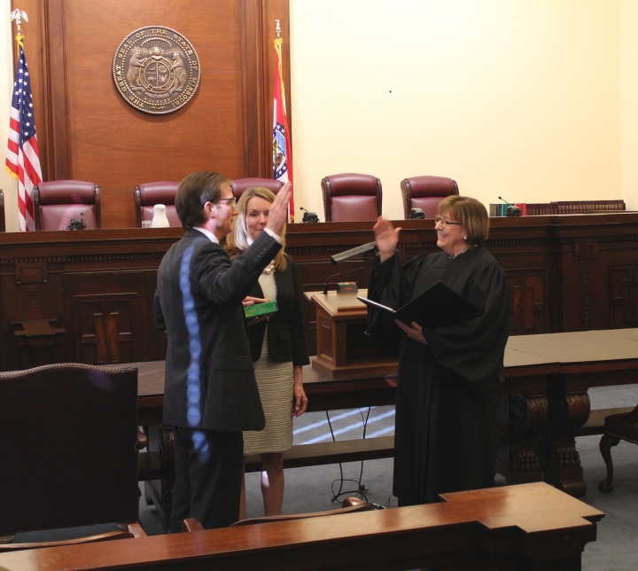 photo of Chief Justice Breckenridge swearing in Judge Brent Powell