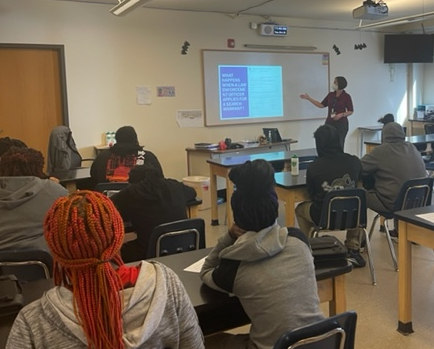 Jackson County Judge Janette Rodecap asks middle school students whether a search is reasonable under the Fourth Amendment