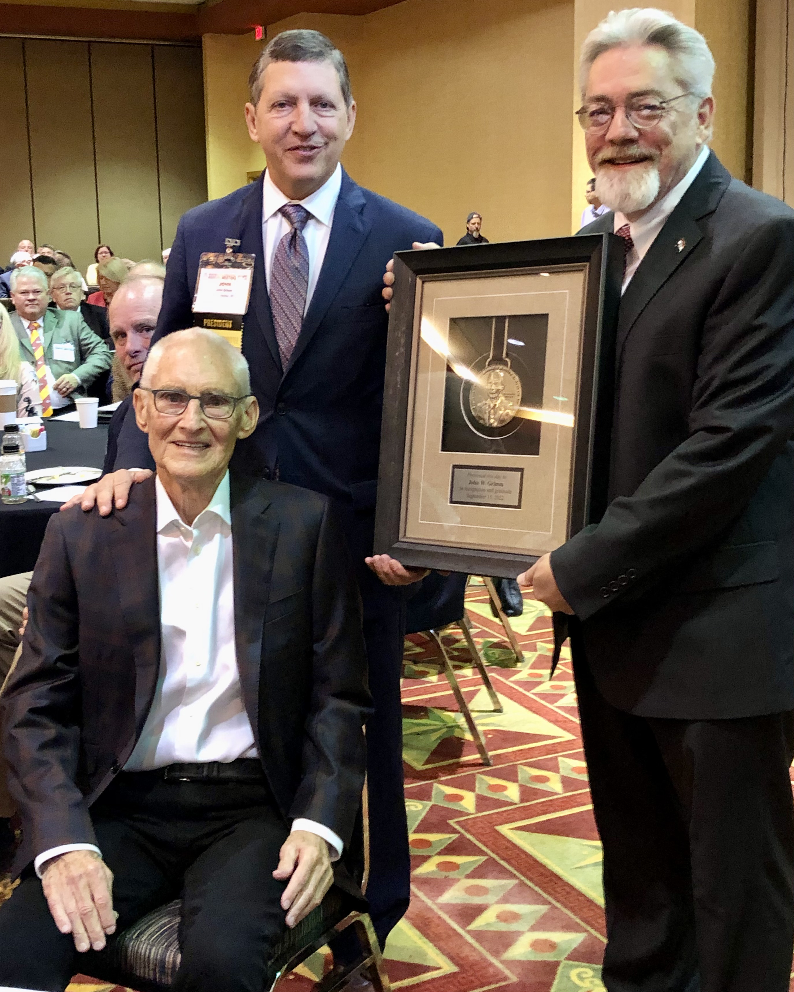 John Grimm receives first Maurice B. Graham award