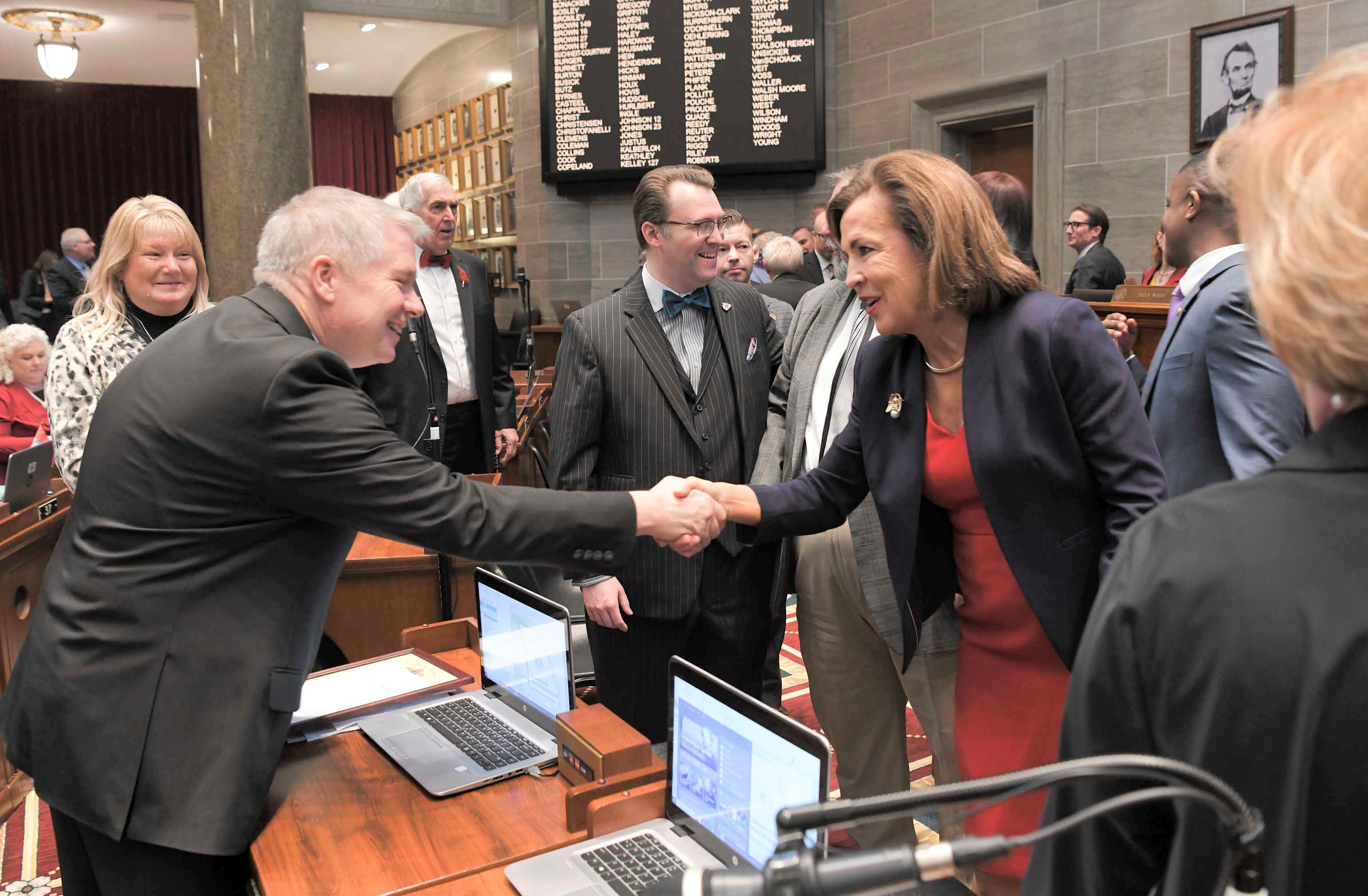 CJ Russell speaks with legislators after 2024 SOJ - 1048