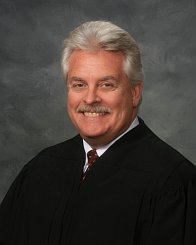Professional headshot of Judge William W. Francis, Jr. (Retired)