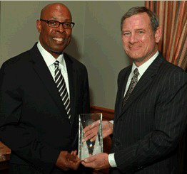 St. Louis Judge Jimmie Edwards receiving the 2013 Rehnquist Award from United States Chief Justice John G. Roberts Jr.