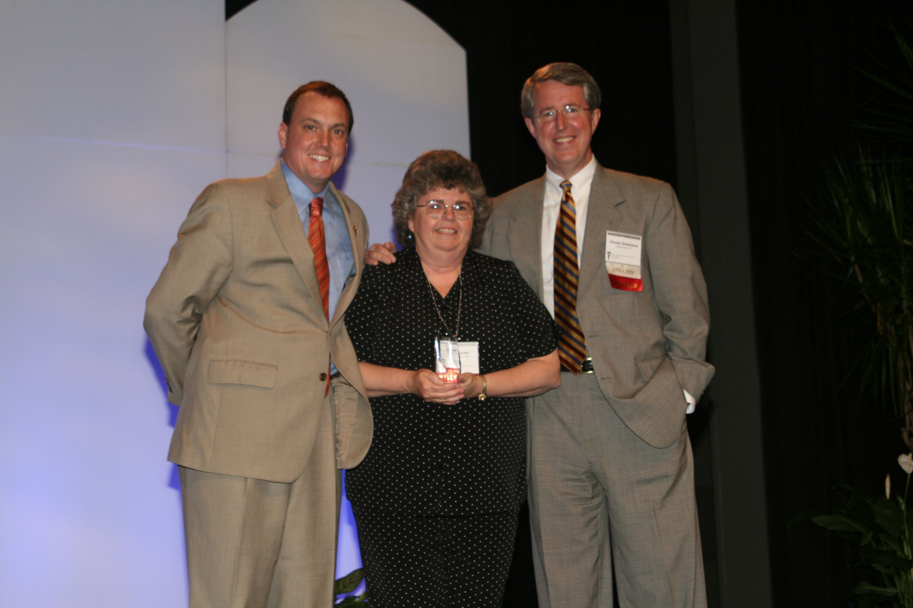 Photo of Ann Wilson with West Huddleston and Judge Chuck Simmons